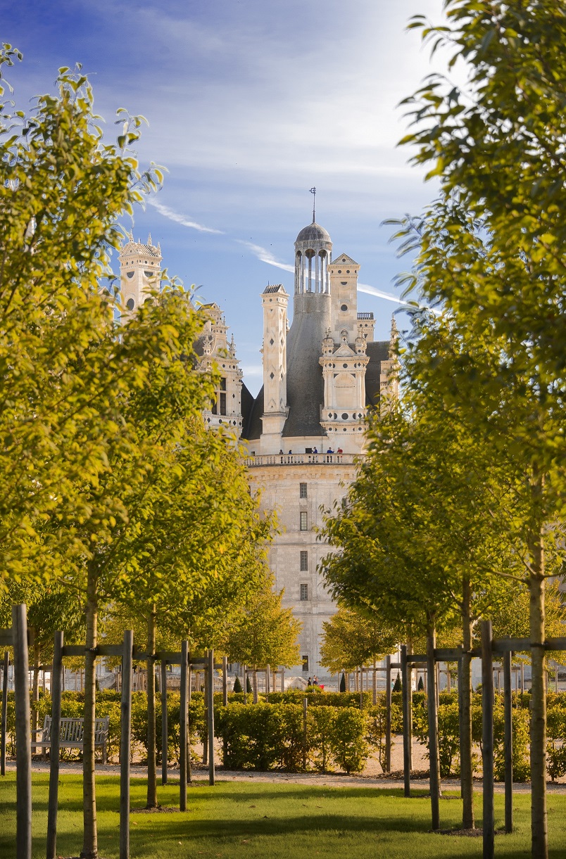 Renaissance architecture of Château de Chambord, France captured on a cloudy day.