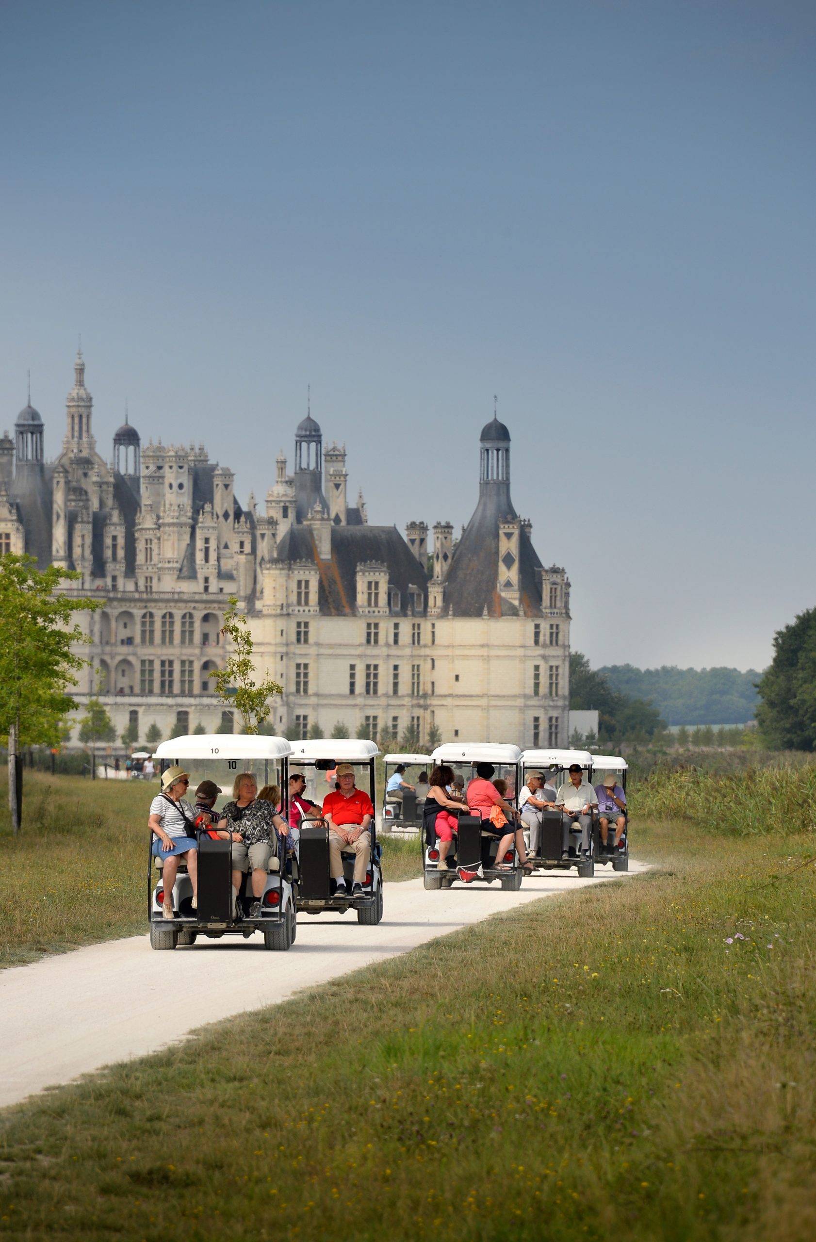 Renaissance architecture of Château de Chambord, France captured on a cloudy day.